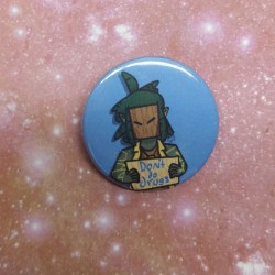 A closeup of the 25mm badge