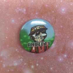 A closeup of the 25mm badge